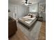 Stylish bedroom with a plush rug, comfortable bed, and modern decor accents at 1713 Archdale Dr, Charlotte, NC 28210