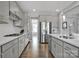 Spacious kitchen with stainless steel appliances, ample countertop space, and modern grey cabinetry at 187 Tetcott St, Mooresville, NC 28115