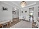 Open-concept space with hardwood floors, detailed trim, and decorative lighting at 187 Tetcott St, Mooresville, NC 28115
