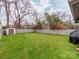 Large, fenced backyard with a shed, providing a private outdoor space for recreation and relaxation at 1916 Pegram St, Charlotte, NC 28205