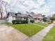 Charming home showcasing its well-manicured front lawn, inviting porch, and neat landscaping at 1916 Pegram St, Charlotte, NC 28205