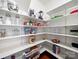 Walk-in pantry with ample shelving and storage space for kitchen essentials at 2217 Blue Bell Ln, Charlotte, NC 28270