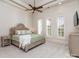 Bedroom with large windows, white walls, carpet flooring, and a ceiling fan at 235 Blue River Rd, Clover, SC 29710