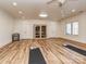 Spacious exercise room with wood flooring, a personal sauna, and large windows at 235 Blue River Rd, Clover, SC 29710