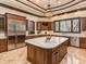 Well-appointed kitchen with an island, stainless steel appliances, and custom cabinetry at 235 Blue River Rd, Clover, SC 29710