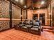 Home theater room with leather recliners, a projector, and a decorative ceiling for ultimate entertainment at 235 Blue River Rd, Clover, SC 29710