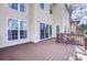 Spacious wood deck perfect for outdoor entertaining, with access to the home and backyard views at 2689 Wingrave Nw St, Concord, NC 28027