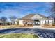 Exterior of community center with seating area and sidewalks at 2689 Wingrave Nw St, Concord, NC 28027