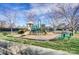 Community playground with benches, a green play structure, and mature trees at 2689 Wingrave Nw St, Concord, NC 28027