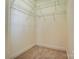 Walk-in closet with carpeted floors and white wire shelving at 2689 Wingrave Nw St, Concord, NC 28027
