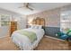 This charming bedroom features elegant wallpaper, natural light, and a cozy, inviting atmosphere at 2727 Tiergarten Ln, Charlotte, NC 28210