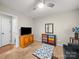 Comfortable bedroom with stylish furniture, a modern TV, and great natural light at 2727 Tiergarten Ln, Charlotte, NC 28210