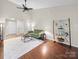 Open living room with vaulted ceiling at 2727 Tiergarten Ln, Charlotte, NC 28210