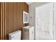 Contemporary bathroom featuring a sleek vanity, modern fixtures, and unique wall paneling, combining style and functionality at 2729 Springbrook Cir, Gastonia, NC 28052