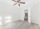 Bright, spacious bedroom featuring neutral walls and modern ceiling fan at 2729 Springbrook Cir, Gastonia, NC 28052