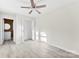 This large bedroom has neutral walls, fan, and ensuite bathroom at 2729 Springbrook Cir, Gastonia, NC 28052