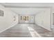 Inviting living room with bright natural light, and sleek light gray flooring at 2729 Springbrook Cir, Gastonia, NC 28052