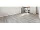 Open concept living area with stylish floors and stainless steel kitchen appliances at 2729 Springbrook Cir, Gastonia, NC 28052