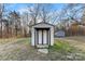 Storage shed with double doors and concrete platform at 2729 Springbrook Cir, Gastonia, NC 28052