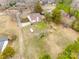 Aerial view of a home, surrounded by trees and a large yard, showcasing its peaceful and private setting at 2745 Bonnybrook Cir, Rock Hill, SC 29732