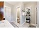 Bathroom featuring an open view to the bedroom, toilet room, walk-in shower, and modern fixtures at 2745 Bonnybrook Cir, Rock Hill, SC 29732