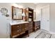 Well-lit bathroom with double vanities, stylish mirrors, and ample storage space for toiletries at 2745 Bonnybrook Cir, Rock Hill, SC 29732