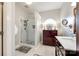 Bright bathroom featuring a glass shower and stylish vanity with a unique arched window at 2745 Bonnybrook Cir, Rock Hill, SC 29732