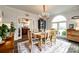 Dining room boasts natural light, stylish furniture, and a seamless transition to the hallway at 2745 Bonnybrook Cir, Rock Hill, SC 29732