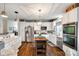 Modern kitchen with stainless steel appliances, a functional island, and sleek granite countertops at 2745 Bonnybrook Cir, Rock Hill, SC 29732