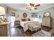 Tranquil main bedroom with tray ceiling, wood floors, and large windows for ample natural light at 2745 Bonnybrook Cir, Rock Hill, SC 29732