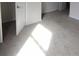 Bright bedroom featuring neutral carpet, white doors and trim, and plenty of natural light at 2792 5Th Ne Ave, Hickory, NC 28601