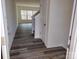 Inviting foyer with luxury vinyl plank flooring and staircase to the upper level at 2792 5Th Ne Ave, Hickory, NC 28601