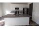 Modern kitchen featuring granite counters, stainless steel appliances, and kitchen island at 2792 5Th Ne Ave, Hickory, NC 28601