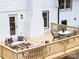 Relax on this new deck with stylish seating and dining areas, perfect for outdoor living at 301 Dollar Cir, Charlotte, NC 28270