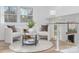 Cozy loft area featuring comfortable seating, soft lighting, and a stylish rug at 301 Dollar Cir, Charlotte, NC 28270