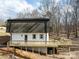 Inviting home features a brand new deck, great for entertaining and enjoying the outdoors at 301 Dollar Cir, Charlotte, NC 28270