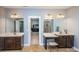 A spacious bathroom boasts dual vanities and a separate vanity area with a doorway leading into the bedroom at 3173 Delaware Dr, Denver, NC 28037