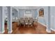 A formal dining area boasting hardwood floors and decorative lighting at 3173 Delaware Dr, Denver, NC 28037