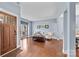 Cozy living room with hardwood floors, comfortable seating, and lots of natural light at 3173 Delaware Dr, Denver, NC 28037