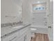 A full bathroom featuring white vanity with granite countertops, shower and tile flooring at 318 Lewis Ferry Rd, Statesville, NC 28677