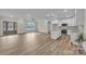 Open-concept living space showcasing the kitchen, living, and dining areas, creating a warm and inviting atmosphere at 318 Lewis Ferry Rd, Statesville, NC 28677