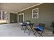 Inviting patio with seating, ideal for relaxing and enjoying outdoor moments at 318 Lewis Ferry Rd, Statesville, NC 28677