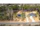 Aerial shot of a lovely home nestled among mature trees, showcasing its expansive lot at 326 Lewis Ferry Rd, Statesville, NC 28677