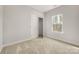 Bedroom featuring carpet flooring, a window with natural light, and a closet, offering a cozy and functional space at 326 Lewis Ferry Rd, Statesville, NC 28677