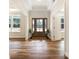 Bright foyer with hardwood floors, a decorative door, and ample natural light flowing through large windows at 326 Lewis Ferry Rd, Statesville, NC 28677