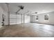 Spacious three car garage with high ceilings, windows and concrete flooring at 326 Lewis Ferry Rd, Statesville, NC 28677