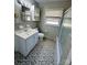 Bathroom featuring vanity with mirror, medicine cabinet, tiled floor, toilet, and shower with glass door at 344 Circleview Dr, Shelby, NC 28150