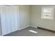 Neutral bedroom features new carpet, fresh paint, and a window letting in plenty of natural light at 344 Circleview Dr, Shelby, NC 28150
