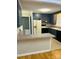 Well-lit kitchen featuring an oven, refrigerator, and countertop with a neutral color scheme at 344 Circleview Dr, Shelby, NC 28150