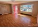 Spacious living room features hardwood floors and large windows at 344 Circleview Dr, Shelby, NC 28150